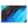 Large wool area rug with dramatic blue and gray brushstrokes on black background