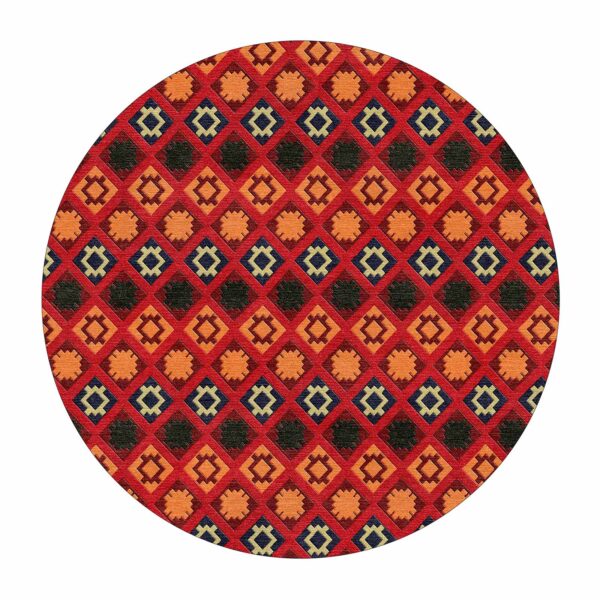 Custom tufted round rug with red Aztec-inspired geometric pattern, 4' diameter