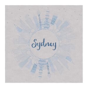 Circular Sydney skyline wool tufted area rug with powder blue architecture and hand-lettered text