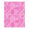 Pink wool area rug with decorative Easter egg pattern featuring swirls and dots in multiple pink shades