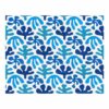 Custom hand-tufted wool rug with abstract blue leaf pattern on white background, size 8x10 feet