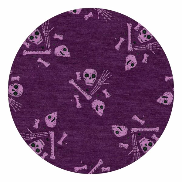 Round purple tufted wool rug with lavender skull and bones pattern, 8 foot diameter