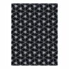 Custom tufted rug with star-like geometric pattern in black, white, and navy, size 9'x12'