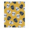 Custom tufted wool rug with cartoon skull pattern in navy and white on yellow background, 8x10 feet rectangle