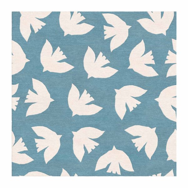 Square hand-tufted wool rug with Matisse-inspired flying bird silhouettes in cream white on sky blue background, 8x8 feet