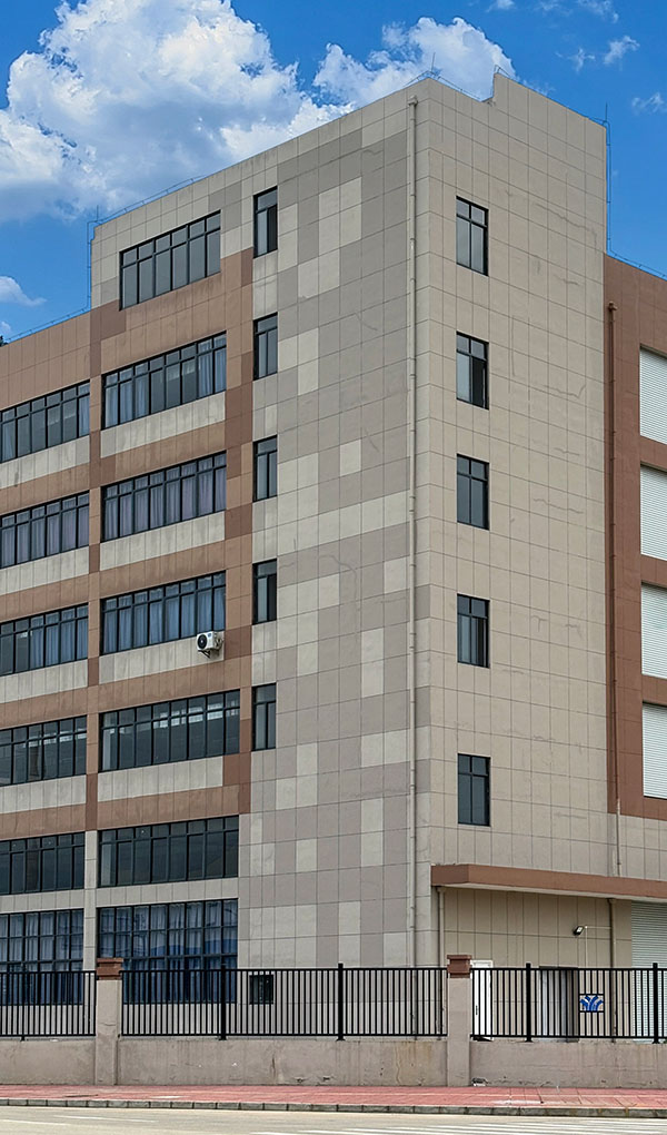 A street view of the production building of a tufted custom rug supplying company