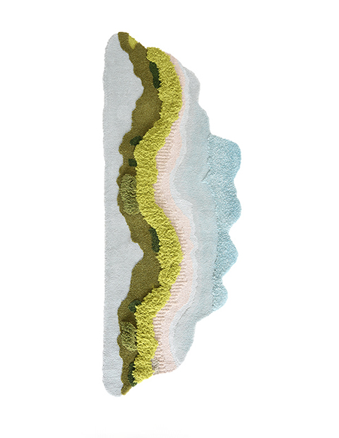 Free-flowing tufted moss rug with curved edges, featuring vertical layers of moss greens, soft pink beach, and pale ocean waters